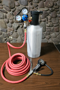 CO2 cylinder connected to air hose and regulator
